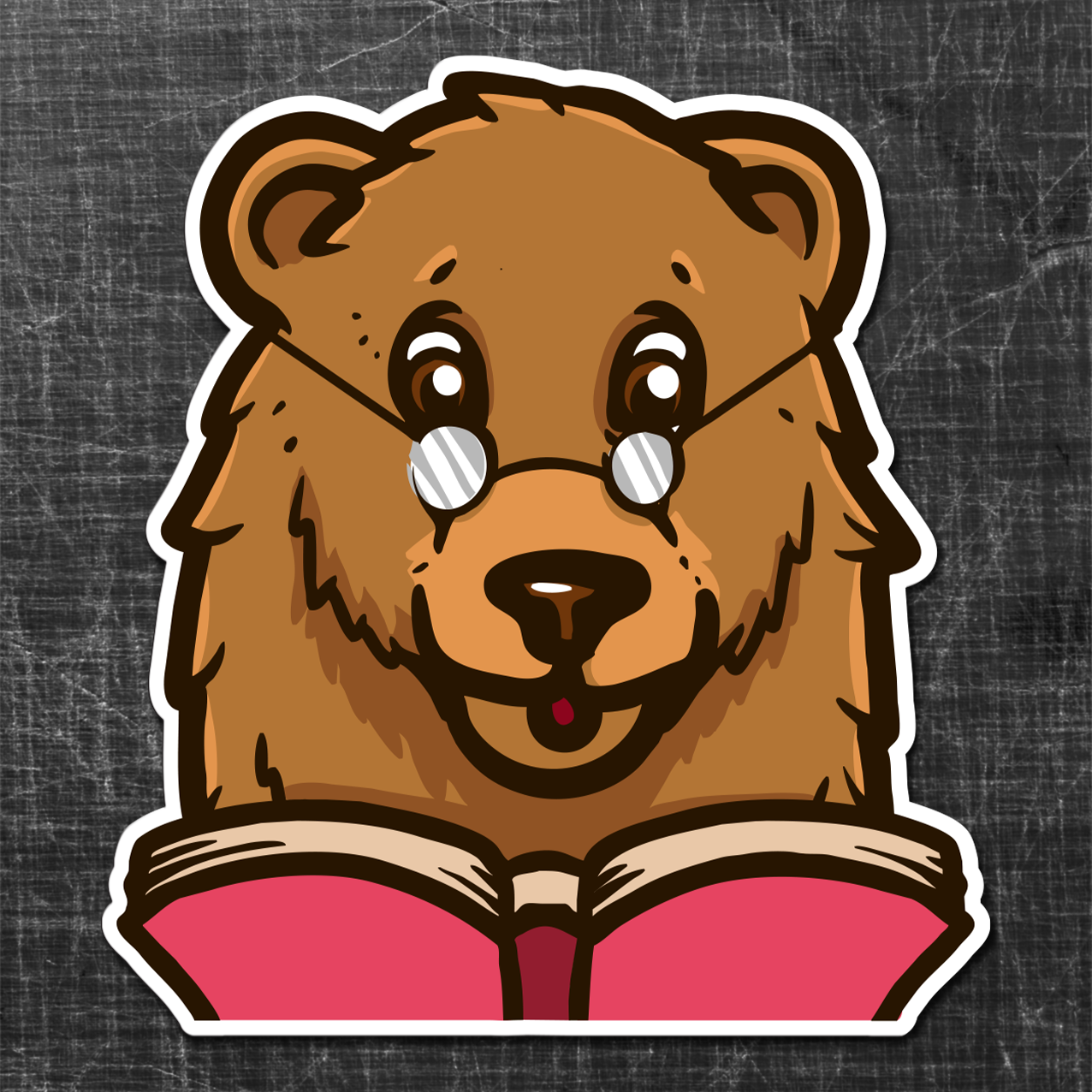 Sticker of a cartoon bear wearing glasses and reading a book. On a grunge background that is actually a cutting mat